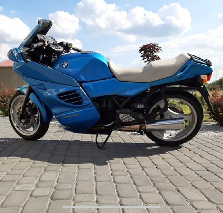 Screenshot of the 2019 sale ad showing a blue BMW K1100 RS with full fairing and cream seat